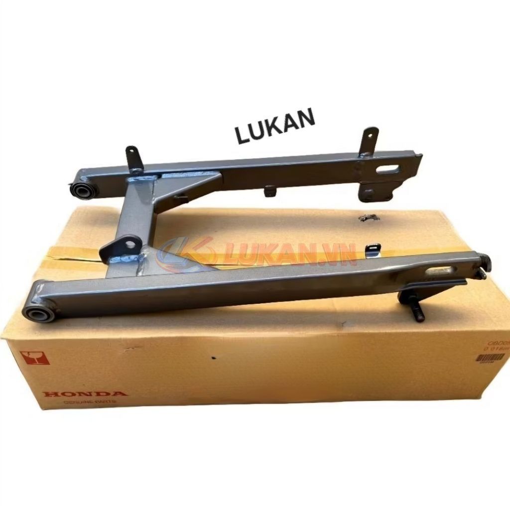 Càng gắp, gấp bánh sau WAVE S110, RSX, BLADE... Xám zin Honda
