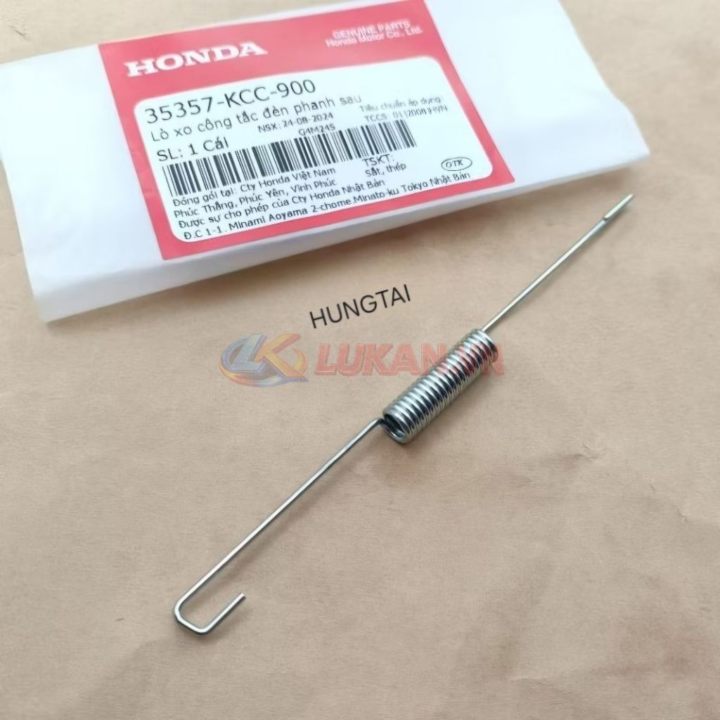 Lò xo stop đèn hậu, đạp phanh WAVE A, RS, S100, RSX.... zin 35357-KCC-900