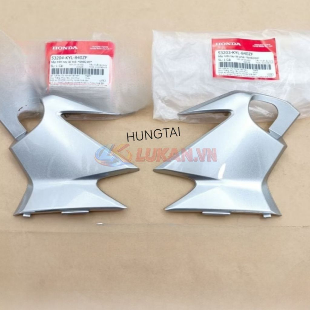 Cặp nhựa ốp vỏ đầu đèn trước tay lái FUTURE X 125... Bạc zin Honda 53204-KYL-840ZF, 53203-KYL-840ZF
